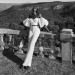 princess-lointaine:Adut Akech, pictured leaning against a wall in trousers and a