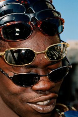 unearthedviews:   SENEGAL. Dakar. From ‘Fashion Magazine’. 2001.   © Martin Parr/Magnum Photos  