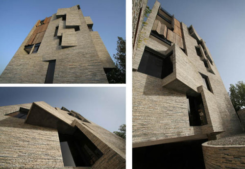 MAHALLAT, IRAN:  An apartment building by Ramin Mehdizadeh with walls made entirely of recycled trav