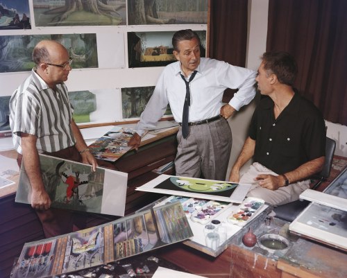 Walt Disney dropping by Eyvind Earle’s office for a late afternoon meeting sometime during the