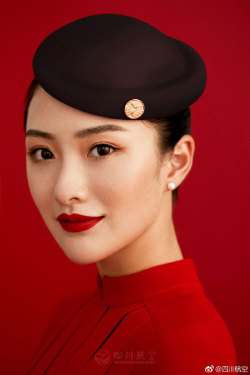 fuckyeahchinesefashion:Flight attendant uniforms of Sichuan Airlines  