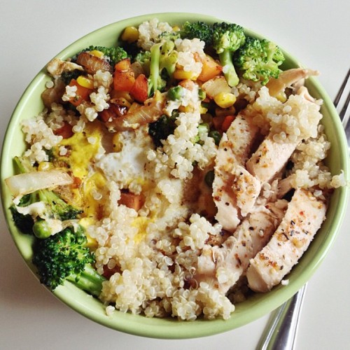 berryhealthy: big bowl of quinoa, chicken, broccoli, red pepper, corn, onion, carrots, peas and an e