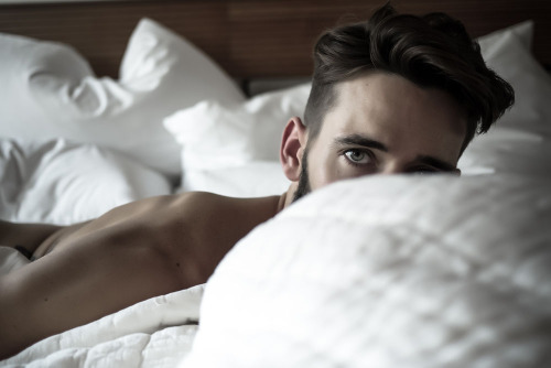 RESERVATIONS : LEVI SEVEN (white sheets) a photo series on the last place we can be anonymous. the hotel room. this series focuses on model Levi Jackson, in the Standard Hotel, the Highline, New York City, New York. photographed by Landis Smithers