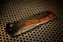 cuscadi:  Benchmade 710 custom scales. Aero cf &amp; koa wood