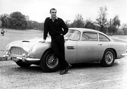 Sean Connery, Aston Martin DB5 / production still from Guy Hamilton’s Goldfinger (1964)