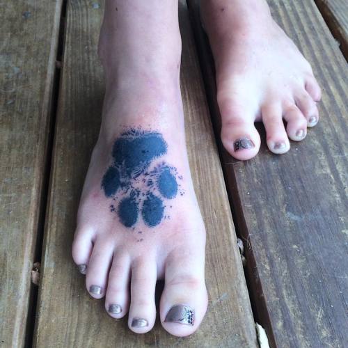 fuckyeahtattoos: The is a stamp of my goldendoodle’s paw print, now he will walk with me everywhere 