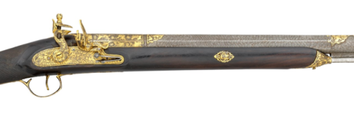 Turkish flintlock rifle with gold decor, 19th century.from Olympia Auctions
