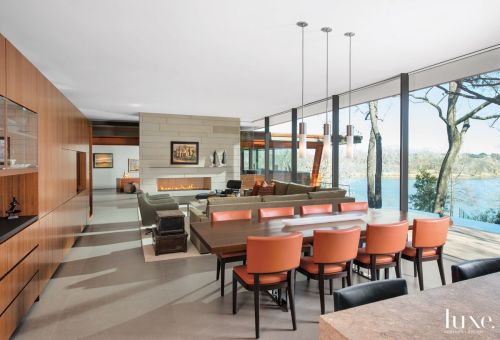 luxe-interiors-and-design:  A Modern Dallas Home With Wood And Stone Exterior Wood and stone allow a modern Dallas home to embrace its forested hilltop setting and create a warm backdrop for an impressive art collection. Read about this home. / Tour this