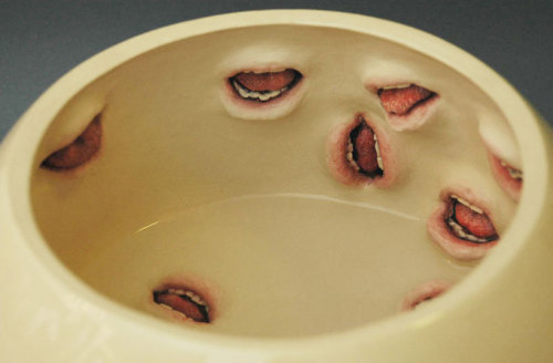 from89:  Ceramic tableware with mouths (by Ronit Baranga) 