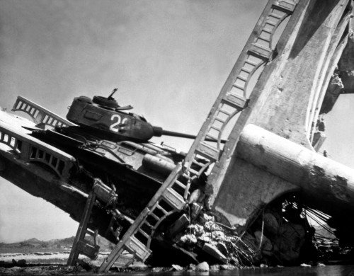 When this North Korean T-34 was caught crossing a bridge south of Suwon, Korea, both bridge and tank