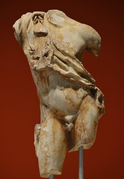 Archaeological Museum of Patra:Torso of a statue of resting Satyr (left)Part of the decoration of a 