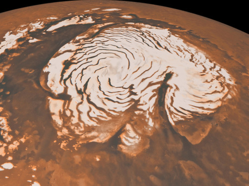 The Spiral North Pole of Mars A  mosaic from ESA’s Mars Express and by the Mars Orbiter Camera on bo