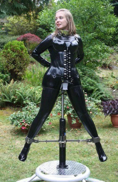 dreamerinchastity:  This is amazing!!! and Yeah, I would do it, I would love to be her, and experience what it would be like to be a lawn ornament for a day… I dream of owning a contraption that could render me as inescapable as this does.I have no