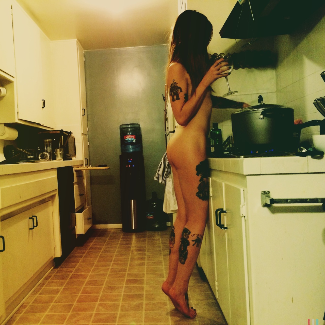 jesschillun:  Just naked in the kitchen whippin up some din din. 