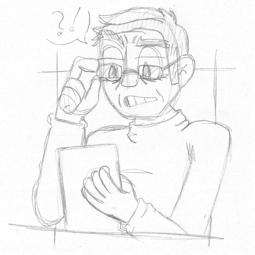 Alistair with reading glasses and a turtleneckAlistair with reading glasses and a turtleneck