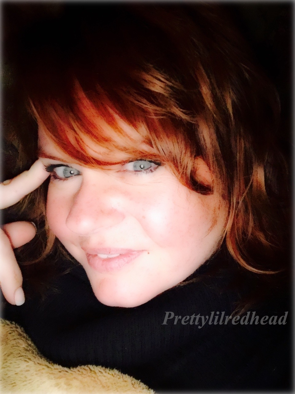 prettylilredhead:  Home from trick-or-treating wrapped in a blanket on my couch….🎃👻🦄👽💀🎃😈