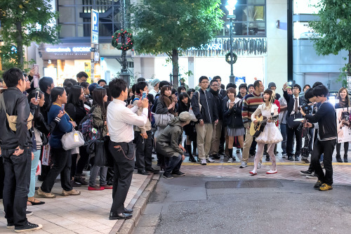 Japanese singer Mariko Goto performing on the street in Shibuya today. There was a big crowd followi