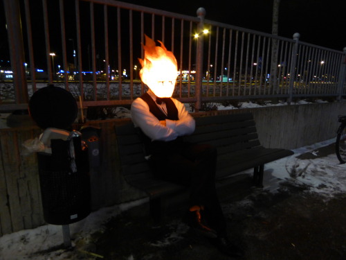 happykittyshop:  flaneurziggy:  A serious shout out to my bff Joel that made the most amazing and stunning Grillby cosplay ever! He spent a lot of time making that mask and getting the lightning effect just right and it payed off really well!It was so