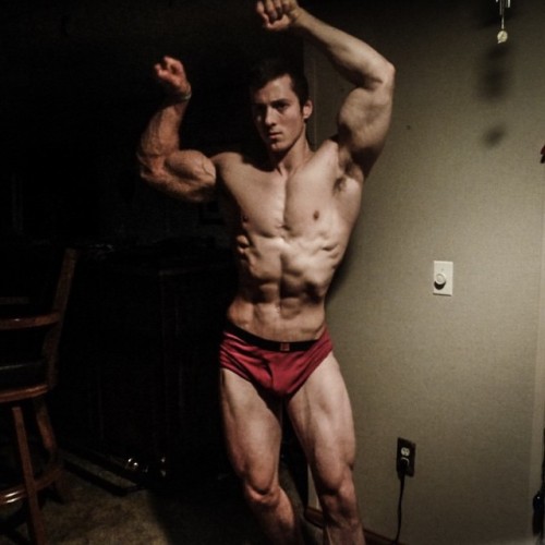 beautifulyoungmuscle:The stunning flexed biceps of Zach Zeiler. Piled high with muscle, studded with veins, rippling with mass and power, they’re erotic totems of beautiful young muscle.