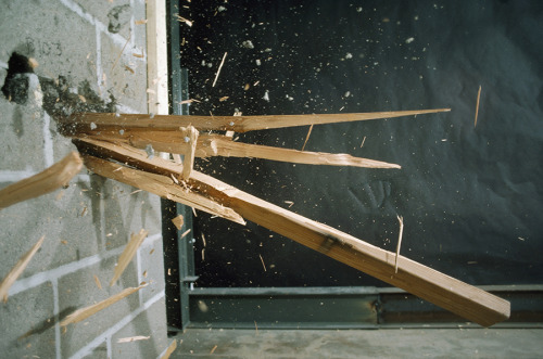 A piece of wood shot from a cannon shows the damage done by tornadoes. Lubbock, Texas, June 1987.Pho