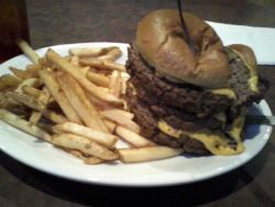 My dinner today, finished that first plate in 10 minutes.  3lb burger, and three orders of fries.  With a glass of Devil’s Backbone Schwartz Bier to wash it down.  Later I had a bowl of ice cream, and two big pb&amp;j sandwiches.  So I’m feeling