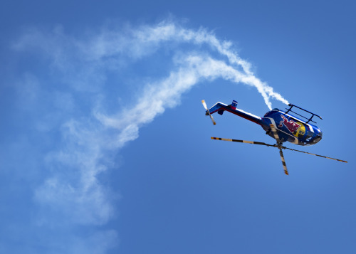 The Red Bull Air Force helicopter does a flip while performing at the Sheppard Air Force Base Guardi