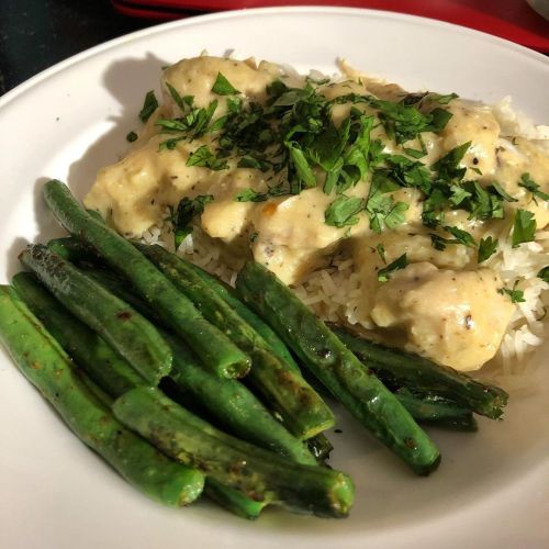 Creamy chicken and rice topped with fresh parsley, served with fresh green beans. This took a couple