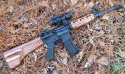 cerebralzero:  risinginsurgency:  Homebuilt AR-15 carbine w/ Boyds’ laminate wood buttstock &amp; handguard.  PSA lower, Aero Precision upper w/ misc. PSA parts &amp; innards.  14.5” Anderson Mfg. barrel w/ YHM Phantom muzzle device pinned &amp;