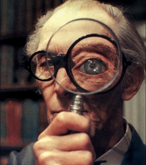 greggorysshocktheater:The sight gag of Peter Cushing and the magnifying glass in Top Secret (1984) i