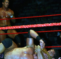 rwfan11:  Batista choking out Edge, sexy