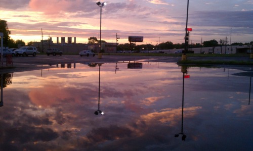 spellboundwitchcraft:Flooded parking lots are beautiful, especially when the speckled asphalt makes 