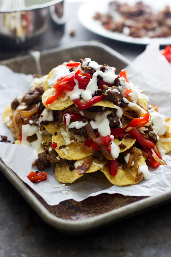 foodffs:  Italian-Style Nachos with Provolone Cheese Sauce, Turkey Sausage and Roasted