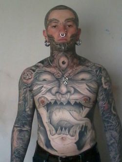 havocdmn:  demonsmoker:  666  i hope he gets more metal piercings. Hope to see the rest of his torso inked too