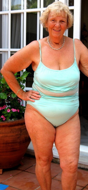 Hereâ€™s a sexy old granny posing in her one piece bathing suit! Doesnâ€™t