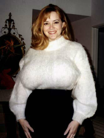 Sweater-monsters….enormous titted Traci Topps is disguising nothing with her giant fat breast