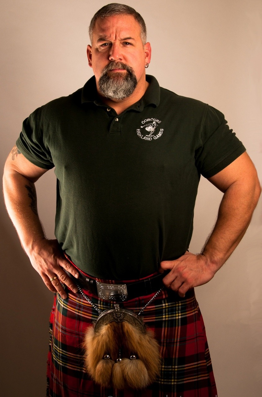 Men in kilts with tattoos