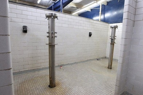 Boy’s showers at Gregory Portland High School.The middle school is currently being rebuilt and this 