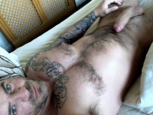 adam2adamtn:  Those sexy eyes… that scruffy face… that masculine hairy bod… that fucking hard uncut cock… DAMN!!! I WANT TO FUCK AROUND WITH HIM!!!!