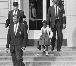 propagandawar:  Ruby Bridges, the brave little African American girl’s entry into an all-white school on November 14, 1960. As soon as Bridges entered the school, white parents pulled their own children out; all teachers refused to teach while a black