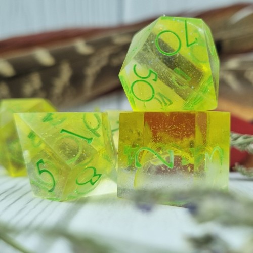 Neon Phoenix  with real budgie feathers https://www.devilsroostdice.com/ 