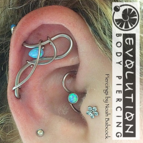 Fresh #industrialpiercing with jewelry by #evolvejewelry and #evolutionmetalworks with a bit of cust