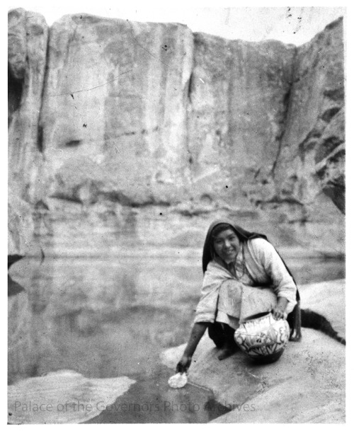pogphotoarchives: Woman filling olla with water, Acoma Pueblo, New MexicoPhotographer: Ina Sizer Cas