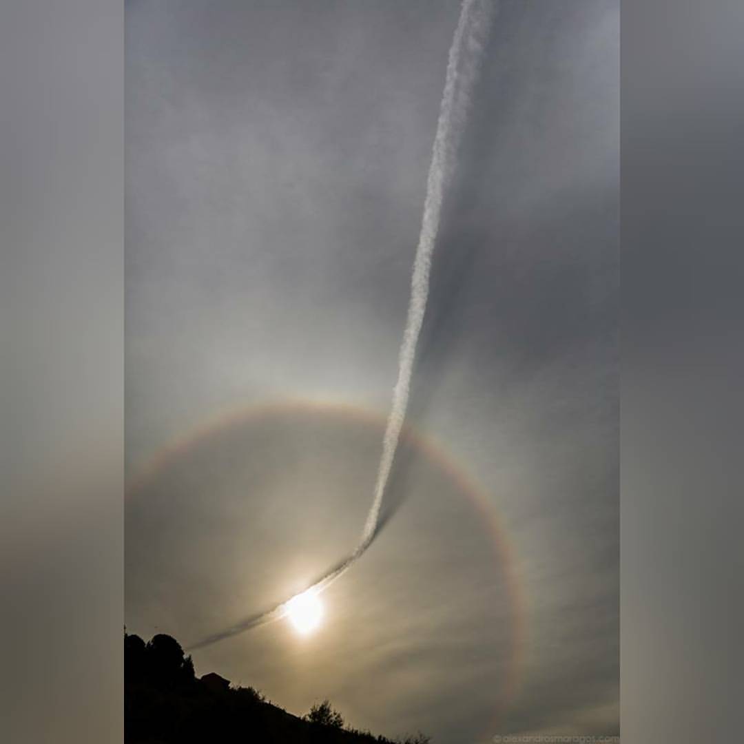 Plane Contrail and Sun Halo #nasa #apod #plane #airplane #contrail #atmosphere #clouds