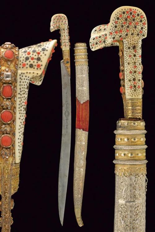 Beautiful Turkish yatagan decorated with silver, brass, red coral, and ivory. 19th century.from Czer