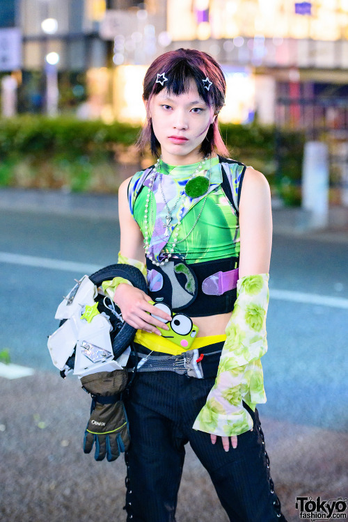 14-year-old Japanese street style personality Raiki on the street in Harajuku wearing a harness by S