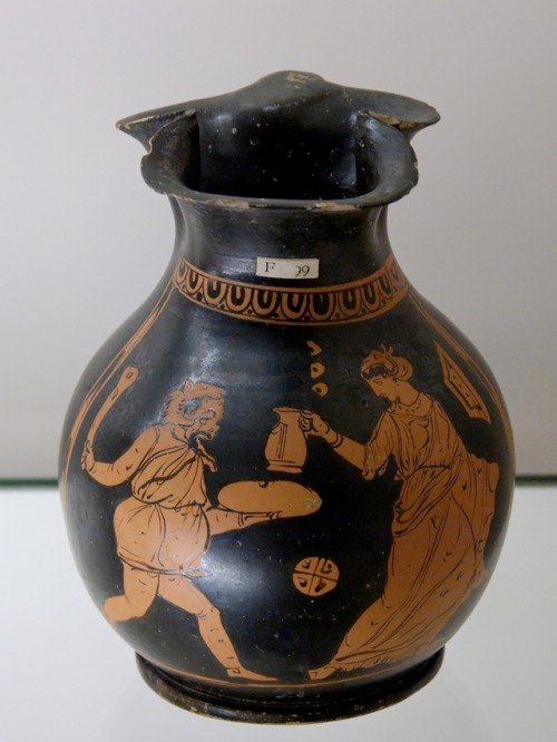 In a scene from a phlyax (mythological burlesque) play, a pot-bellied Heracles pursues a woman.  Apu