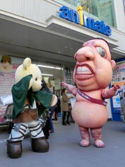  Another shot of the mascots promoting the upcoming SnK exhibition at the Tokyo Ueno Royal Museum (Source)  For those who saw the last post and asked - yep, definitely looks like the Titan who ate Mike &gt;:|