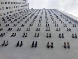 sixpenceee:  440 pairs of women’s shoes were hung on one of the city walls in #Istanbul. This is the number of women murdered by their husbands in Turkey during the year