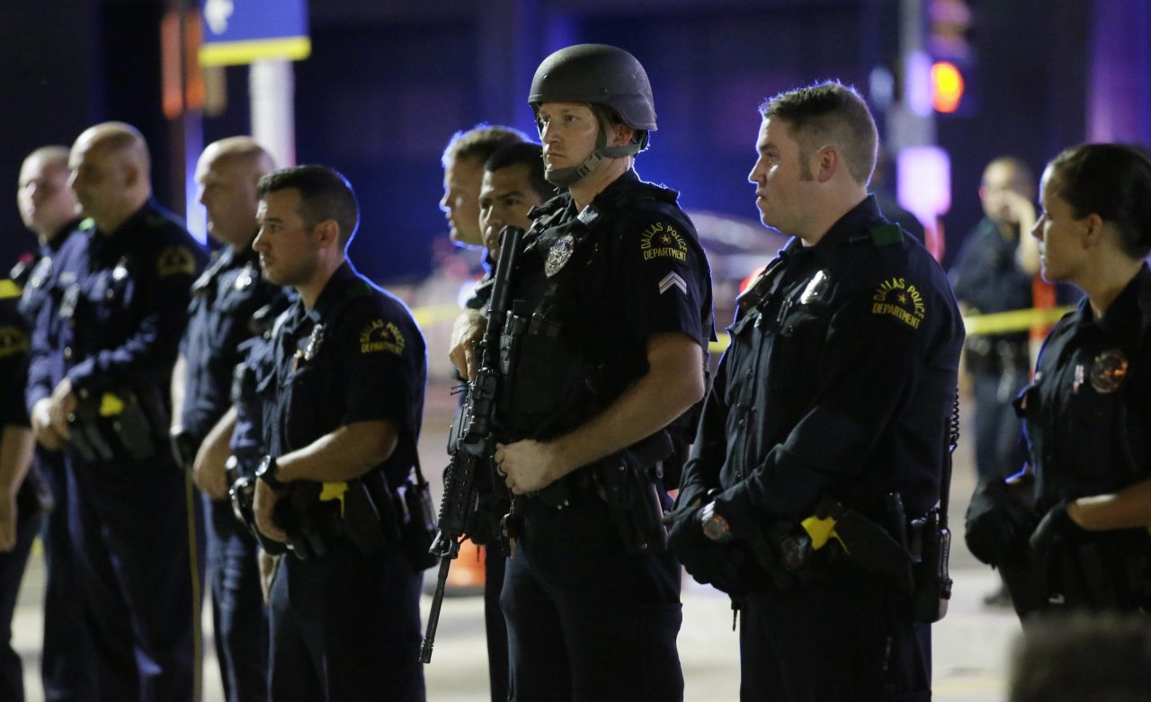 verdigris113:  Police Officers in Dallas bravely secure the city in the wake of a