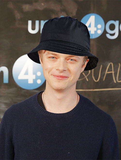 pradanedehaan:dane wearing a bucket hat its real because its a prada bucket hat